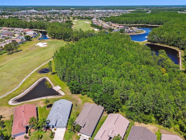 birds eye view of property featuring a water view, golf course view, and a residential view