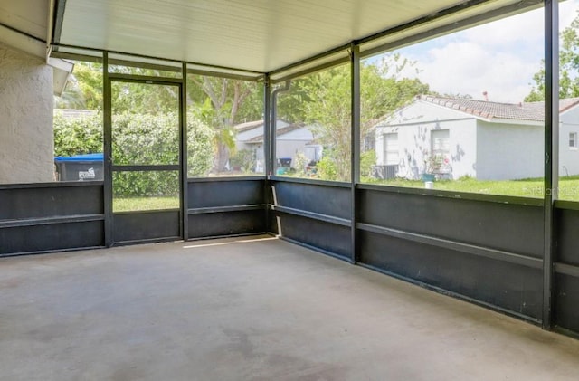 10859 William And Mary Ct, Orlando, FL 32821 - unfurnished sunroom featuring a wealth of natural light