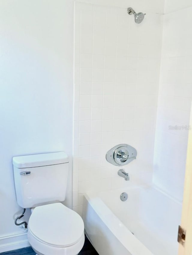 10859 William And Mary Ct, Orlando, FL 32821 - bathroom with shower / bath combination and toilet