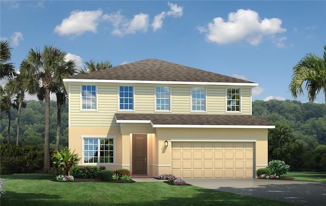 traditional home featuring an attached garage, a shingled roof, a front yard, and concrete driveway