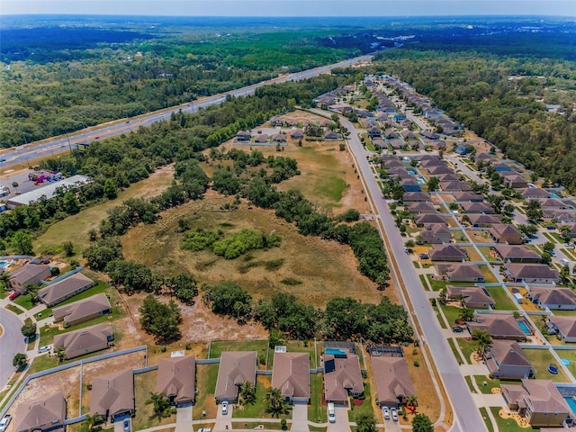 aerial view with a view of trees and a residential view