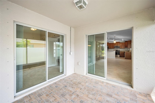 view of patio / terrace with visible vents and a sink