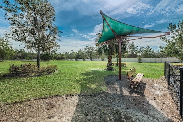 view of yard with fence