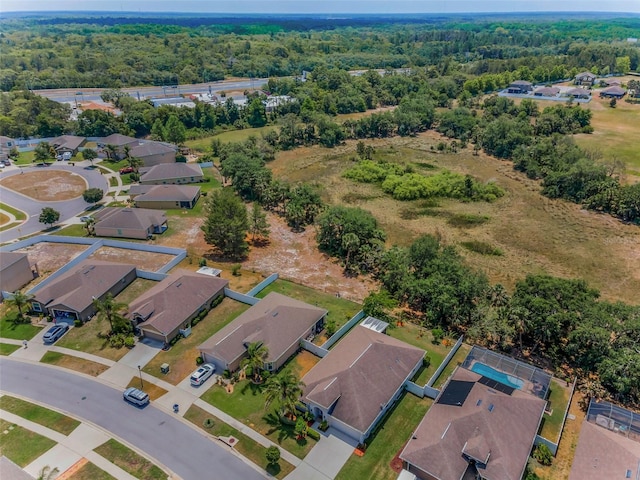 aerial view with a residential view and a forest view