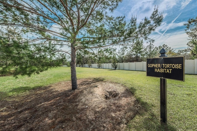 view of yard with fence