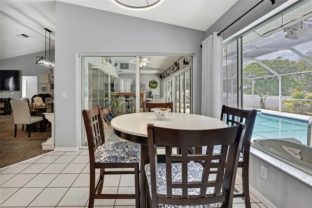13373 Lawrence St, Spring Hill, FL 34609 - dining area with visible vents, a ceiling fan, a sunroom, and lofted ceiling