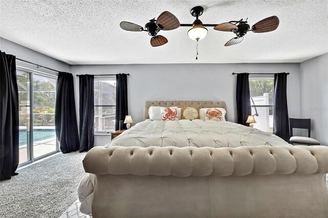 13373 Lawrence St, Spring Hill, FL 34609 - bedroom with carpet flooring, a textured ceiling, ceiling fan, and access to exterior