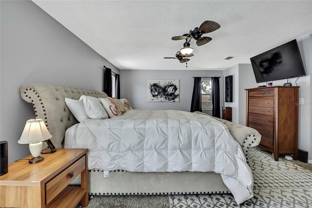 13373 Lawrence St, Spring Hill, FL 34609 - bedroom featuring light carpet, a ceiling fan, and visible vents