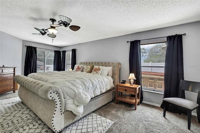 13373 Lawrence St, Spring Hill, FL 34609 - bedroom featuring ceiling fan, carpet, and a textured ceiling