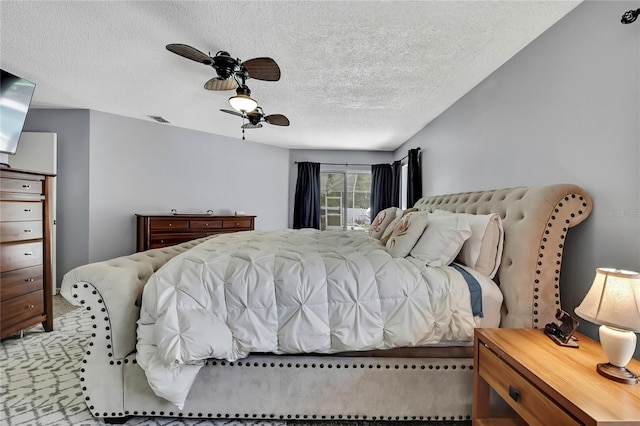 13373 Lawrence St, Spring Hill, FL 34609 - bedroom featuring ceiling fan, a textured ceiling, and visible vents
