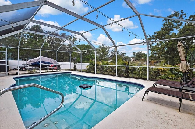 13373 Lawrence St, Spring Hill, FL 34609 - view of swimming pool featuring a fenced in pool, a fenced backyard, and a patio area