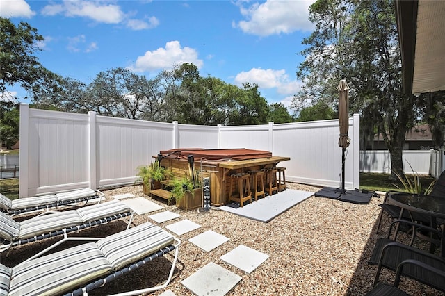 13373 Lawrence St, Spring Hill, FL 34609 - view of patio with a fenced backyard and outdoor dry bar