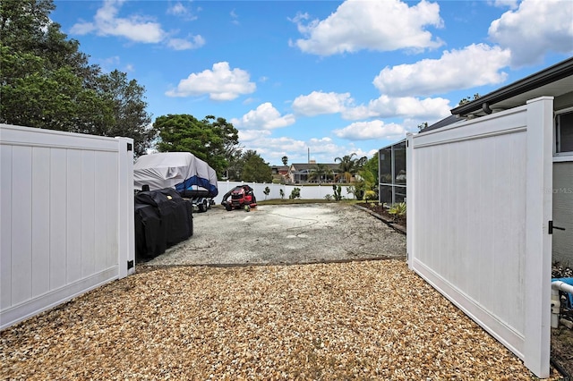 13373 Lawrence St, Spring Hill, FL 34609 - view of car parking featuring fence