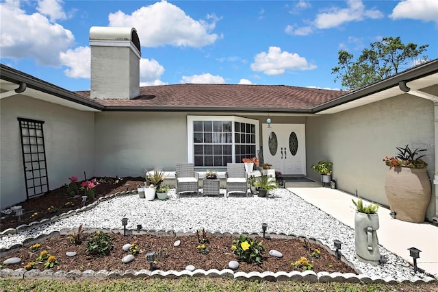 13373 Lawrence St, Spring Hill, FL 34609 - exterior space with a chimney, roof with shingles, and stucco siding