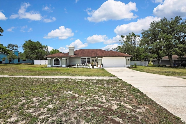 13373 Lawrence St, Spring Hill, FL 34609 - view of front facade with an attached garage, driveway, and a front lawn
