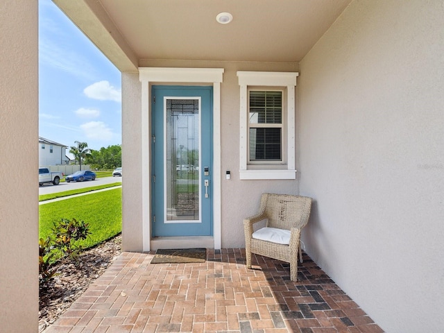 8630 Campus Woods Way, New Port Richey, FL 34655 - entrance to property with stucco siding