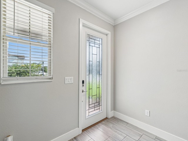 8630 Campus Woods Way, New Port Richey, FL 34655 - foyer with crown molding and baseboards