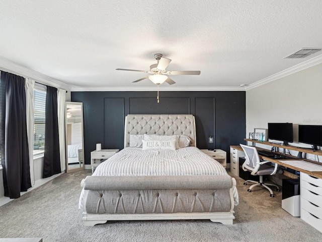 8630 Campus Woods Way, New Port Richey, FL 34655 - bedroom featuring ceiling fan, a textured ceiling, light colored carpet, crown molding, and visible vents