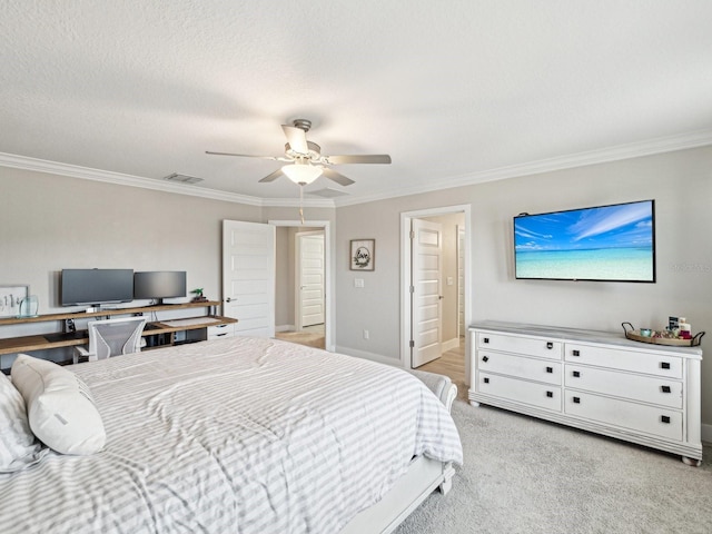8630 Campus Woods Way, New Port Richey, FL 34655 - bedroom with visible vents, ornamental molding, light carpet, baseboards, and a ceiling fan