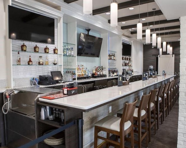 bar featuring a community bar, hanging light fixtures, beamed ceiling, and recessed lighting
