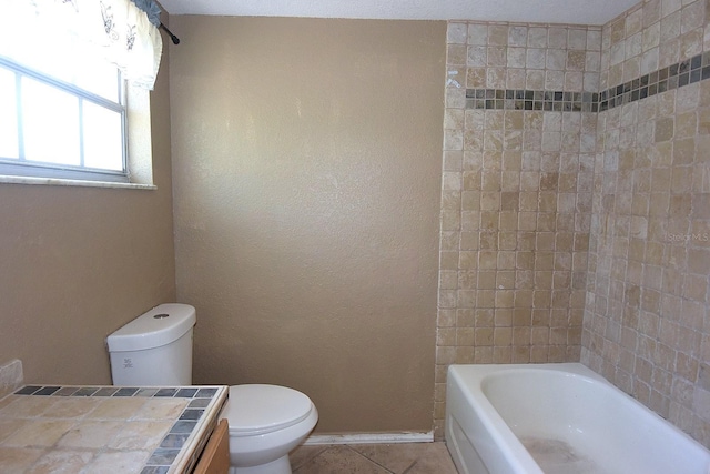 12210 Quail Run Row, Hudson, FL 34667 - full bathroom featuring toilet, baseboards, tile patterned flooring, and vanity