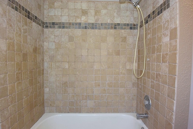 12210 Quail Run Row, Hudson, FL 34667 - bathroom featuring shower / tub combination
