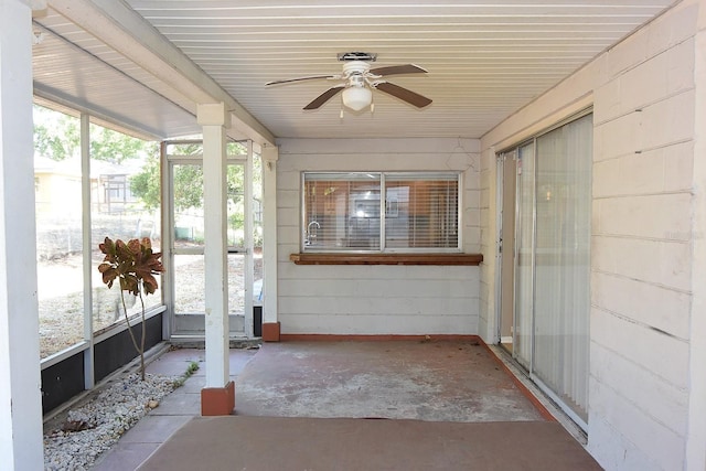12210 Quail Run Row, Hudson, FL 34667 - unfurnished sunroom with ceiling fan