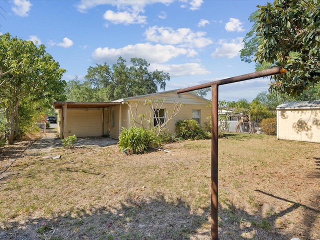back of property featuring a yard