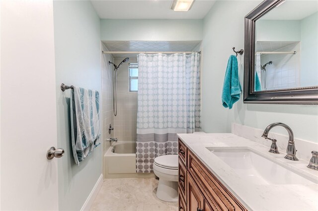 bathroom featuring vanity, shower / bathtub combination with curtain, and toilet