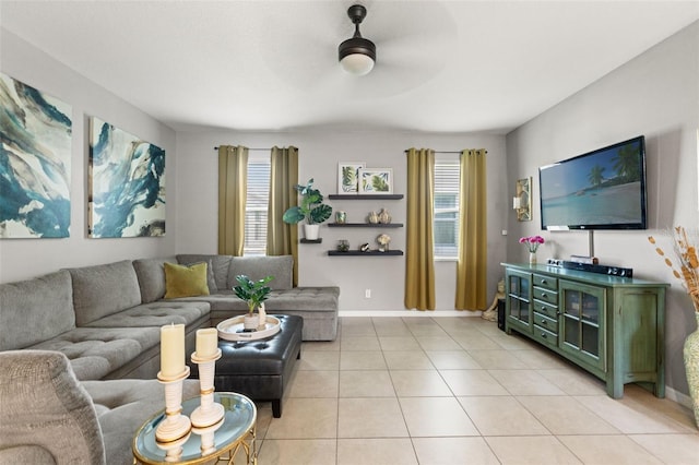 21167 Pleasant Plains Pkwy, Land O Lakes, FL 34637 - living room featuring baseboards, a ceiling fan, and light tile patterned flooring