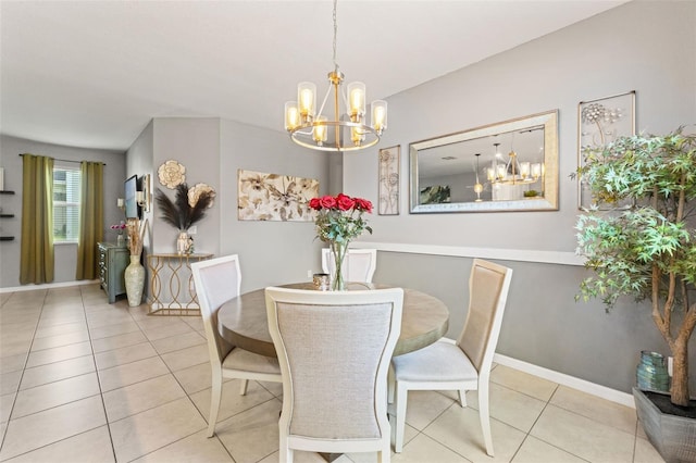 21167 Pleasant Plains Pkwy, Land O Lakes, FL 34637 - dining area with baseboards, light tile patterned floors, and a notable chandelier