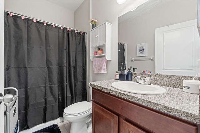 21167 Pleasant Plains Pkwy, Land O Lakes, FL 34637 - full bathroom with vanity, tile patterned flooring, toilet, and curtained shower