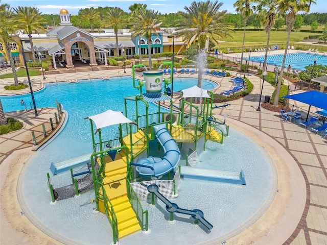 21167 Pleasant Plains Pkwy, Land O Lakes, FL 34637 - view of swimming pool with a water slide and a water play area