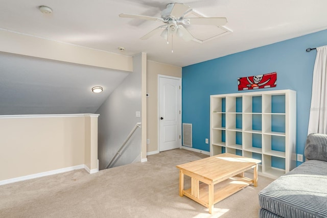 carpeted bedroom featuring baseboards, visible vents, and ceiling fan