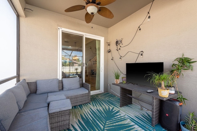 exterior space featuring ceiling fan and outdoor lounge area