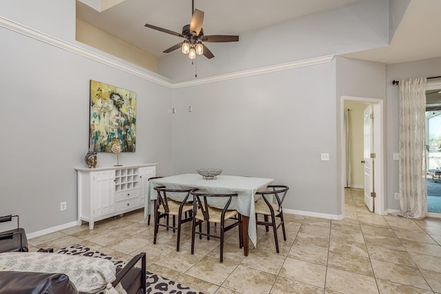 1810 Winsloe Dr, Trinity, FL 34655 - dining space with ceiling fan, baseboards, light tile patterned floors, and a towering ceiling