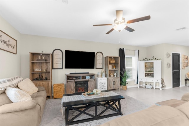 2132 Shining Azul Way, Lutz, FL 33558 - living area featuring a ceiling fan and baseboards