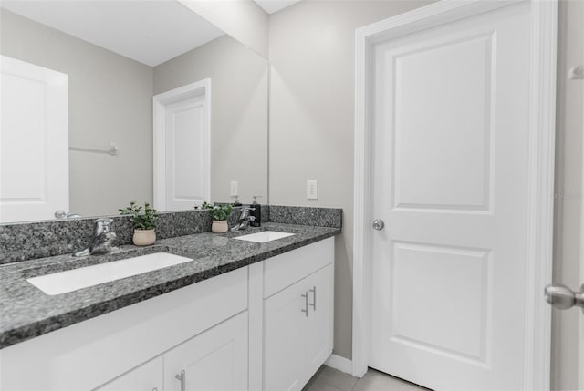 2132 Shining Azul Way, Lutz, FL 33558 - full bath featuring double vanity, baseboards, and tile patterned floors