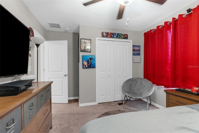 2132 Shining Azul Way, Lutz, FL 33558 - bedroom with baseboards, carpet flooring, a closet, and a ceiling fan