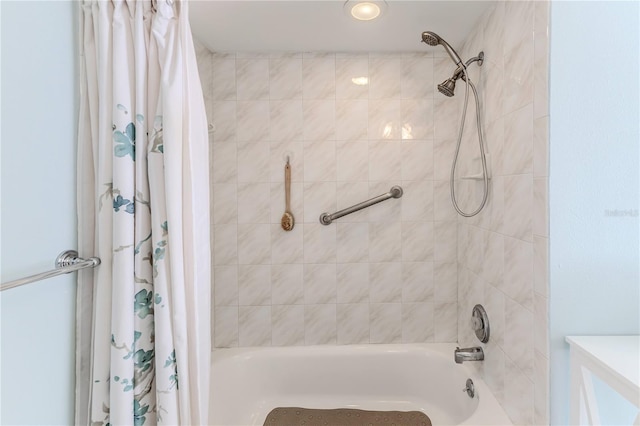 bathroom featuring shower / bath combo and recessed lighting