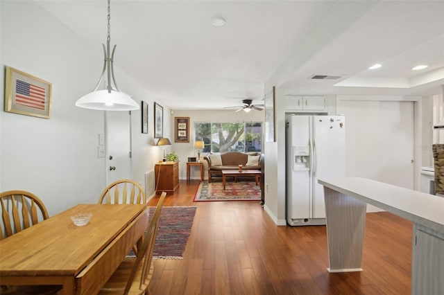 12906 Sandburst Ln, Hudson, FL 34667 - dining area featuring visible vents, baseboards, dark wood-type flooring, recessed lighting, and a ceiling fan