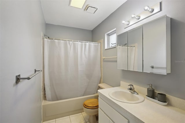12906 Sandburst Ln, Hudson, FL 34667 - bathroom with tile patterned flooring, vanity, toilet, shower / bathtub combination with curtain, and visible vents
