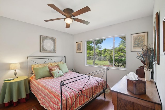 12906 Sandburst Ln, Hudson, FL 34667 - bedroom featuring ceiling fan and wood finished floors