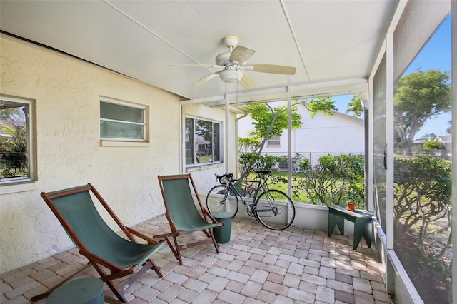 12906 Sandburst Ln, Hudson, FL 34667 - sunroom / solarium featuring ceiling fan