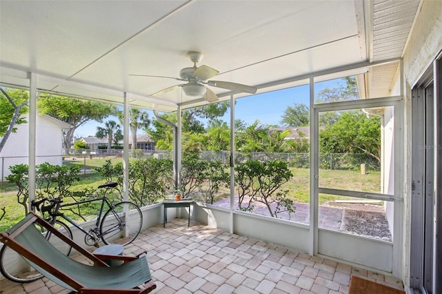 12906 Sandburst Ln, Hudson, FL 34667 - unfurnished sunroom featuring a ceiling fan