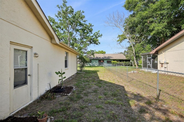 12906 Sandburst Ln, Hudson, FL 34667 - view of yard featuring fence