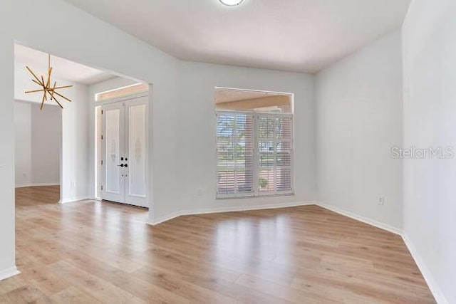 15906 Prince William Pl, Odessa, FL 33556 - unfurnished room featuring baseboards and light wood finished floors