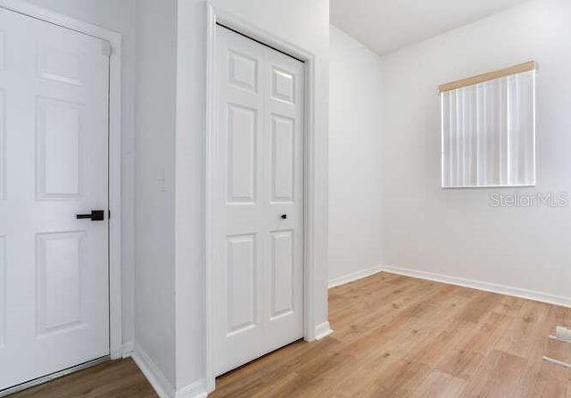 15906 Prince William Pl, Odessa, FL 33556 - unfurnished bedroom featuring wood finished floors and baseboards