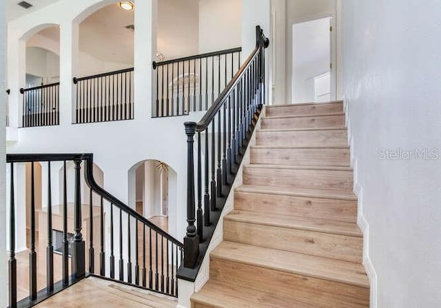 15906 Prince William Pl, Odessa, FL 33556 - staircase featuring wood finished floors