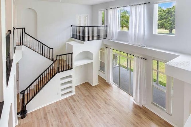 15906 Prince William Pl, Odessa, FL 33556 - foyer entrance featuring wood finished floors, stairway, and a high ceiling